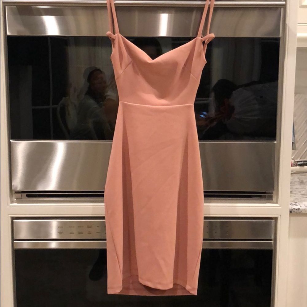 Pink mini dress with open back